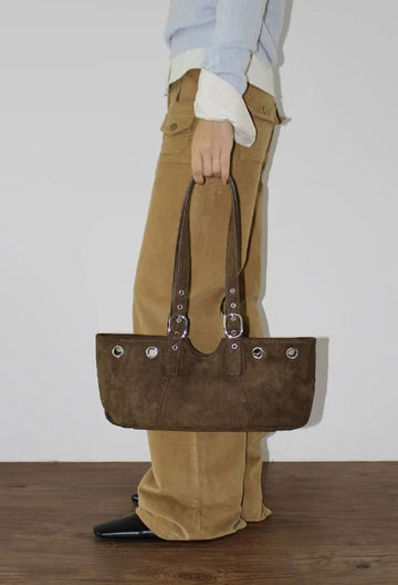EYELET BELTED STRAP BAG